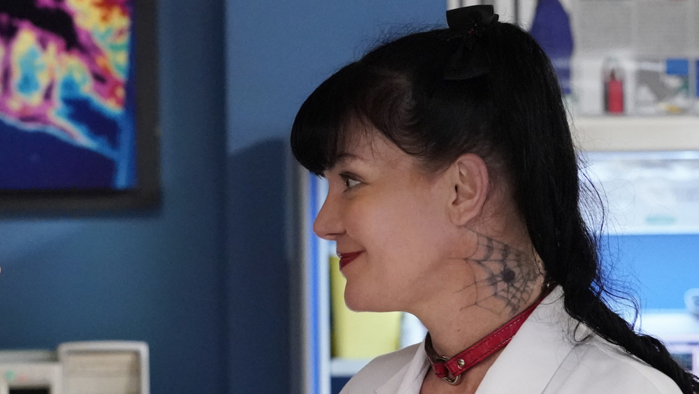 Pauley Perrette on NCIS with a neck tattoo