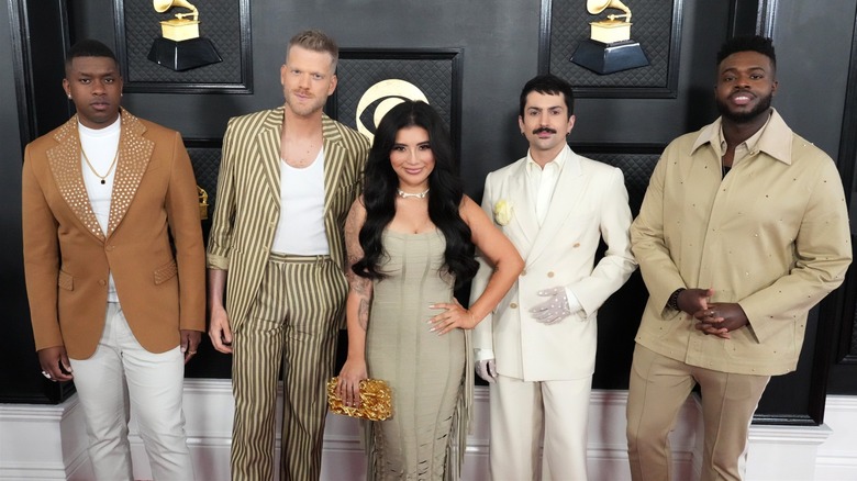 Pentatonix posing at the Grammys