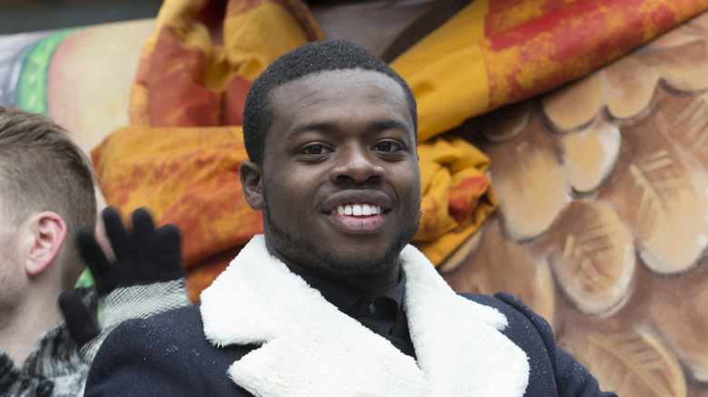 Kevin Olusola attending an event