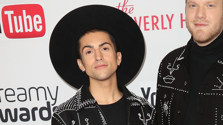 Mitch Grassi wearing a hat