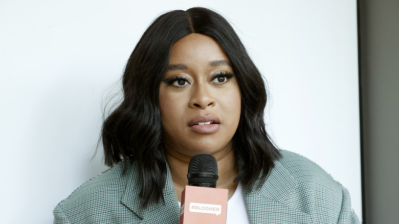 Phoebe Robinson giving an interview