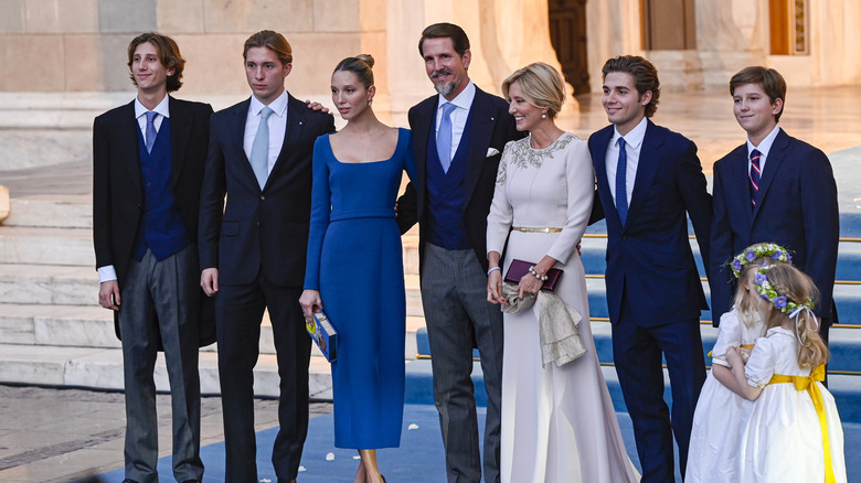 Prince Constantine Alexios standing with his family