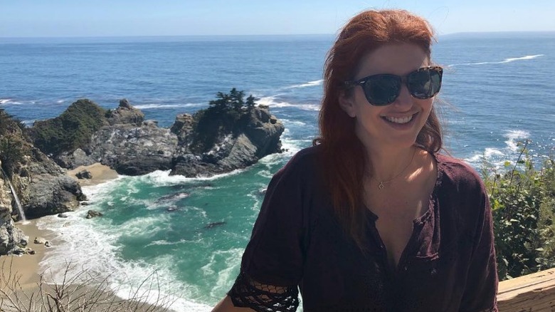 Rachel Nichols in front of the ocean