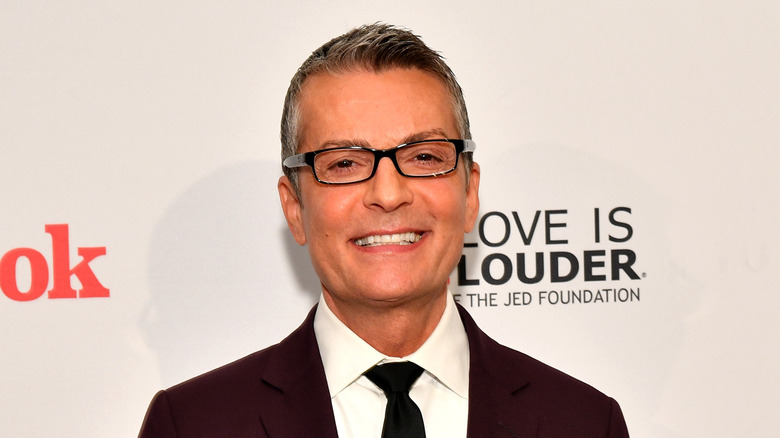 Randy Fenoli in a burgundy suit