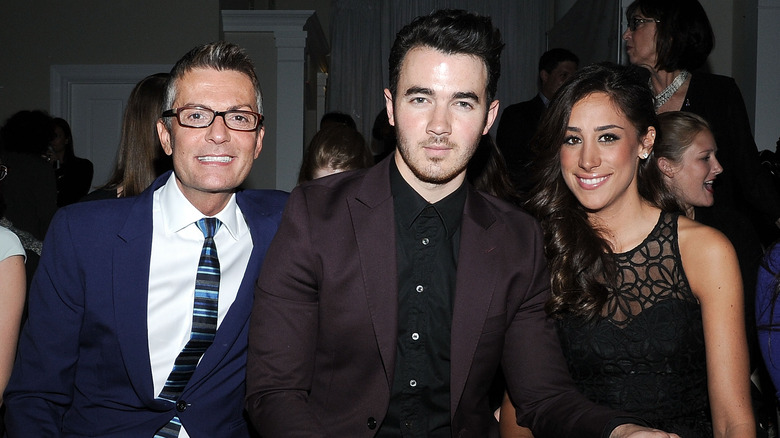 Randy Fenoli with Kevin and Danielle Jonas