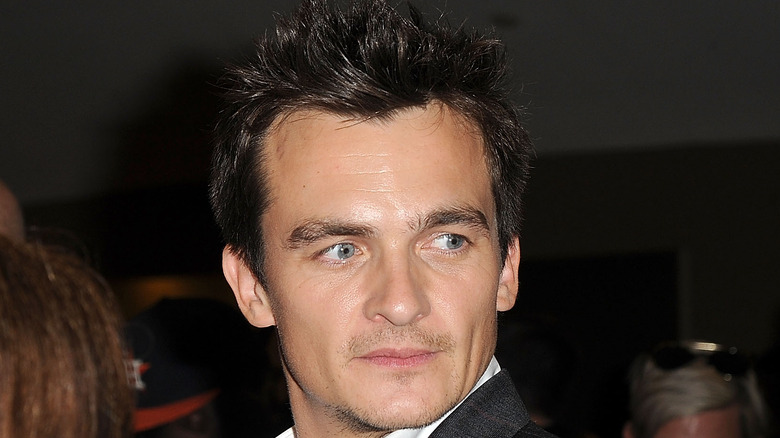 Rupert Friend in a crowd 