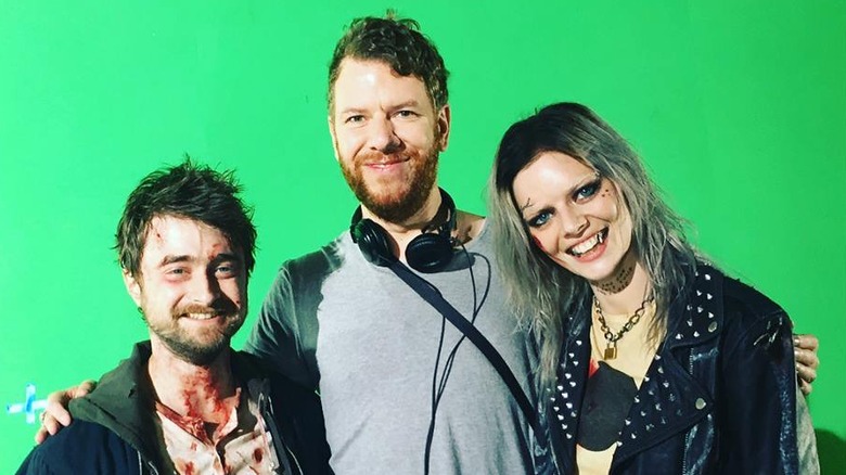 Daniel Radcliffe, Jason Lei Howden, and Samara Weaving on the set of Guns Akimbo