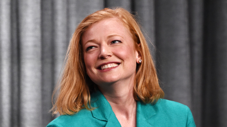 Sarah Snook smiling on stage