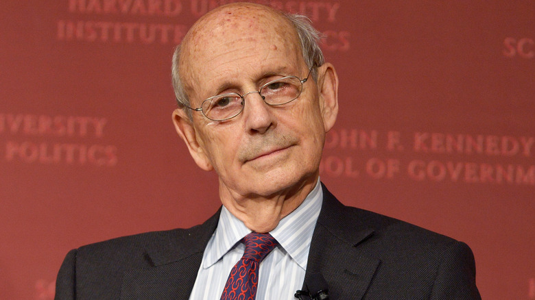 Stephen Breyer wearing a red tie 