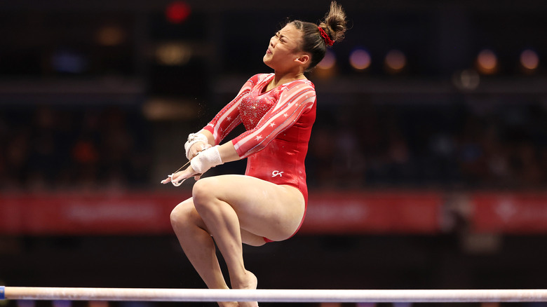 Sunisa Lee jumping on a beam