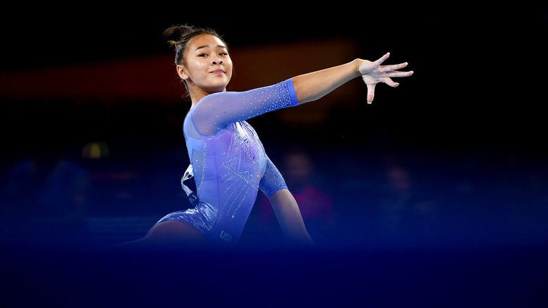 Sunisa Lee dancing in a purple leotard