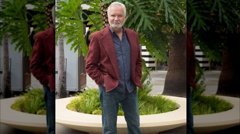 John McCook standing outside