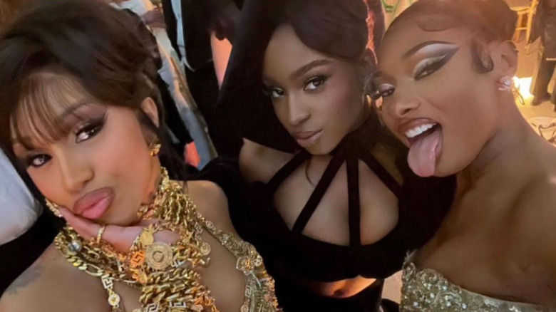 Cardi B and friends smile