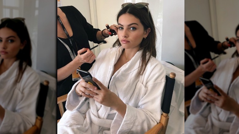 Thylane Blondeau getting makeup done