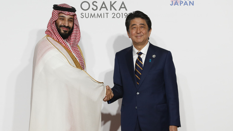 MBS shakes hands with Shinzo Abe