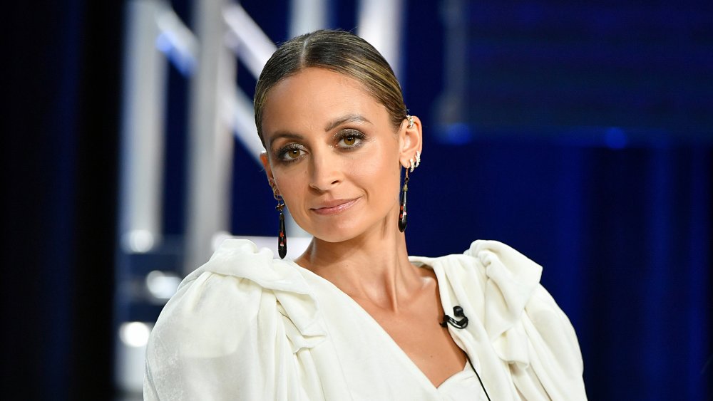 Nicole Richie from The Simple Life at an event, wearing white