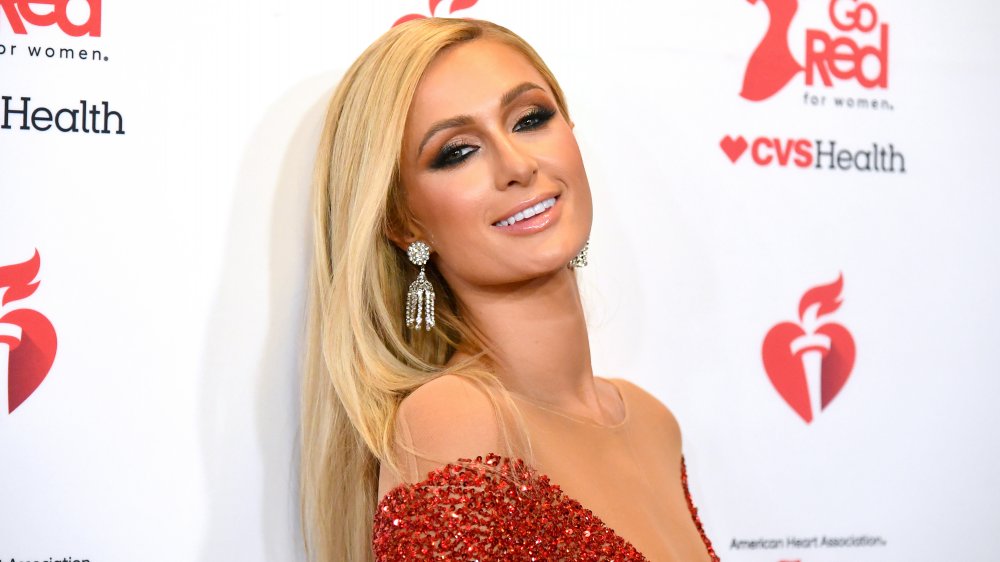 Paris Hilton from The Simple Life wearing red on the red carpet