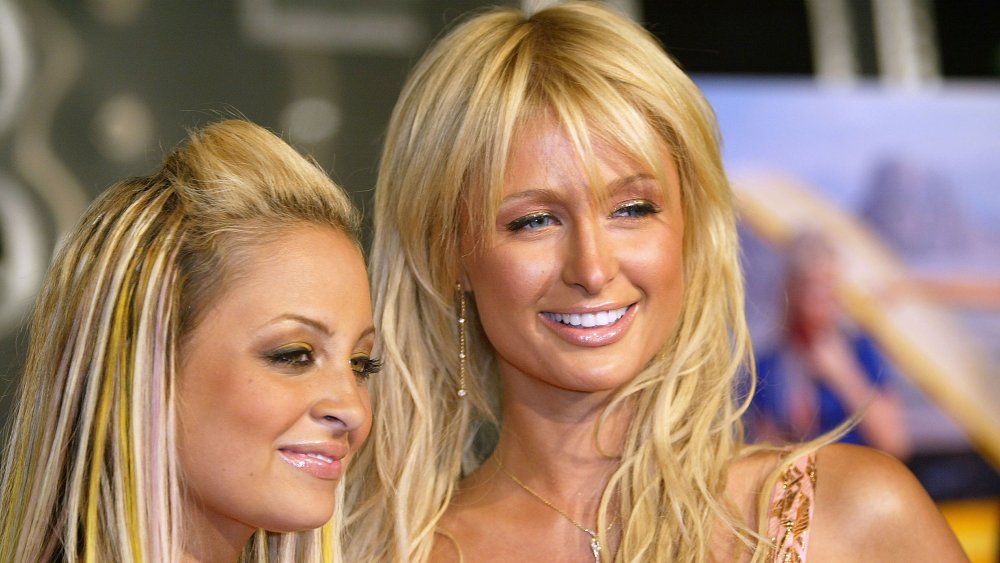 Nicole Richie and Paris Hilton from The Simple Life, smiling, looking left