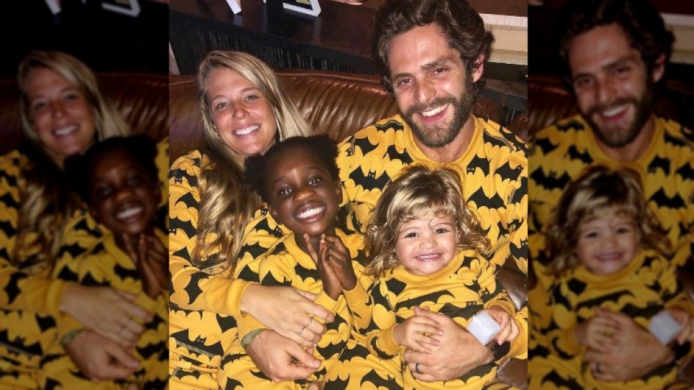 Thomas Rhett and wife Lauren Akins with their daughters