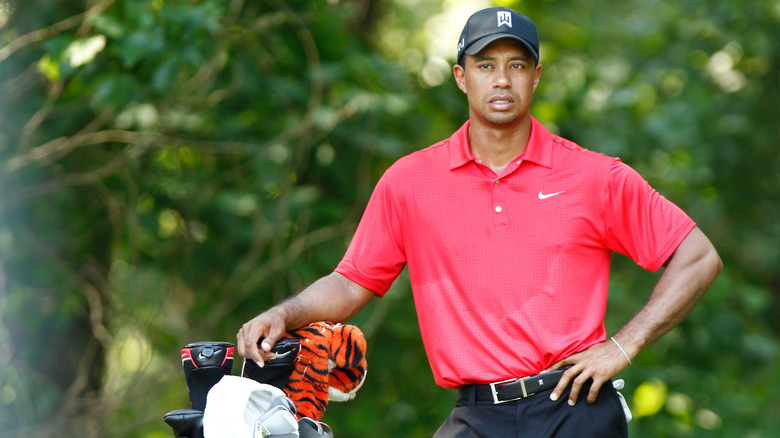 Tiger Woods in red shirt