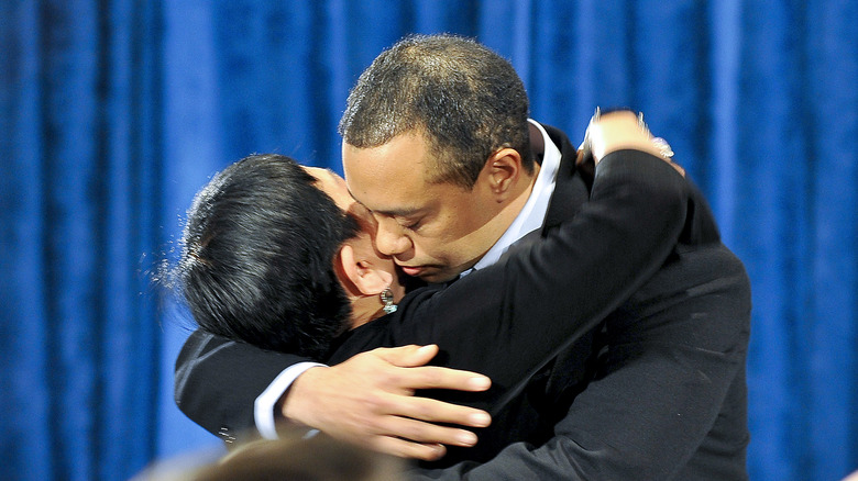 Tiger Woods and Kultida Woods embrace at press conference