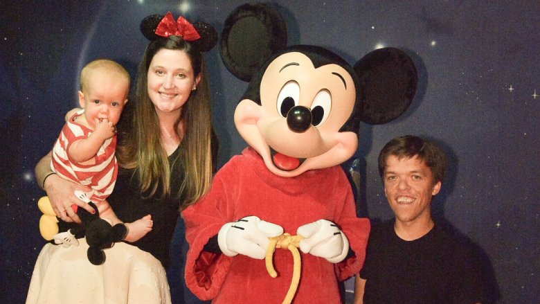 Zach, Tori and Jackson Roloff with Mickey Mouse at Disney World