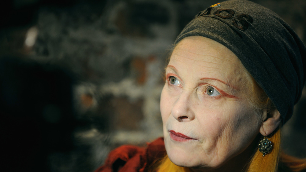 Vivienne Westwood looking to the side, wearing a hat