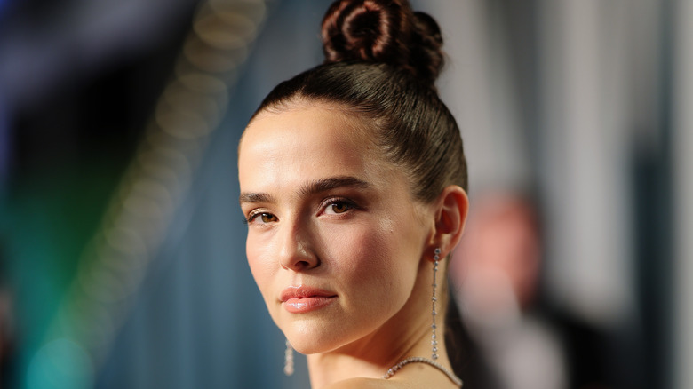 Zoey Deutch with hair in a bun