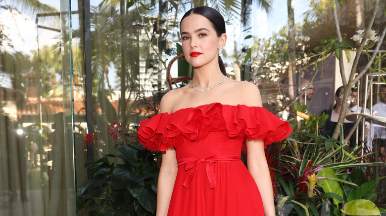 Zoey Deutch in a red dress