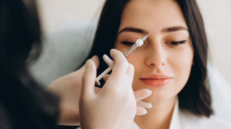 Woman getting a Botox injection