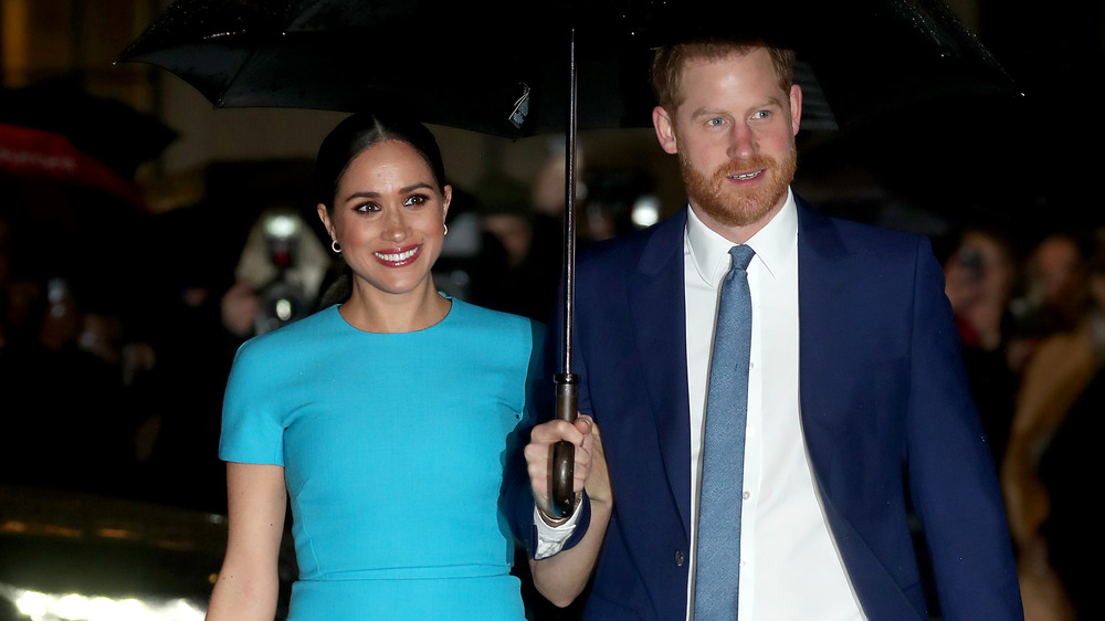 Meghan Markle and Prince Harry smiling