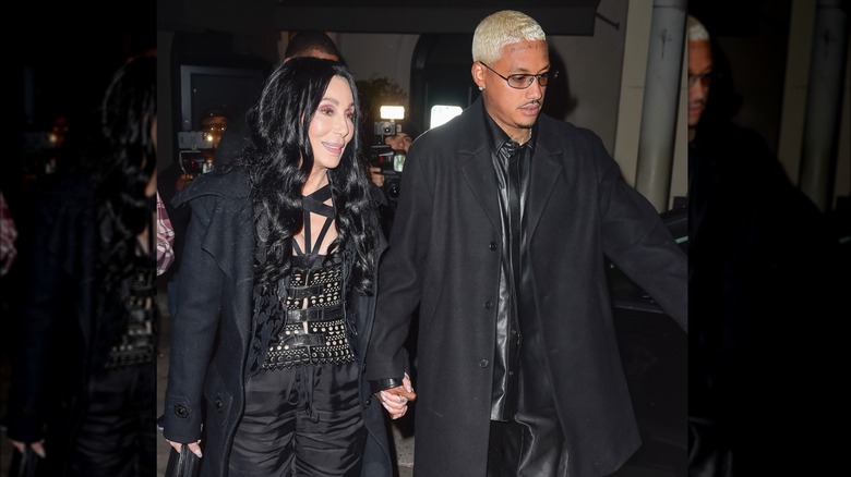 Cher and boyfriend, Alexander Edwards, walking