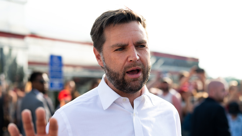 JD Vance speaking with media gathered outside the Park Diner on July 28, 2024 in St Cloud, Minnesota