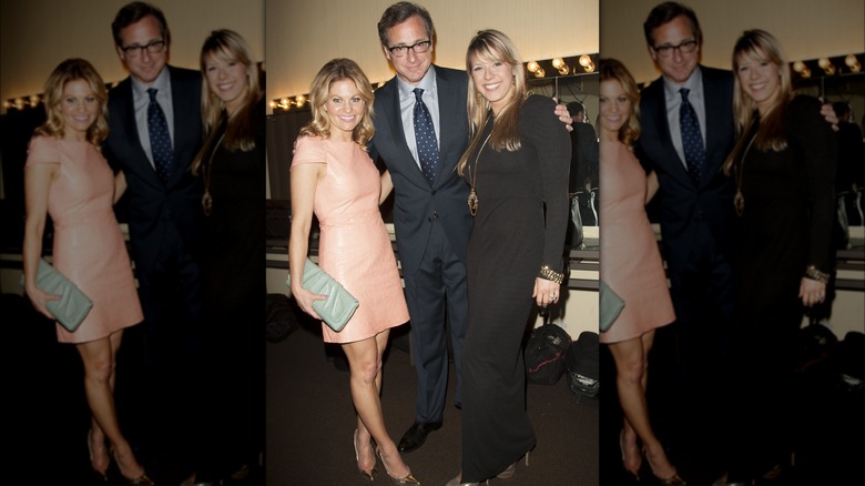 Candace Cameron Bure, Bob Saget, and Jodie Sweetin posing together in 2013