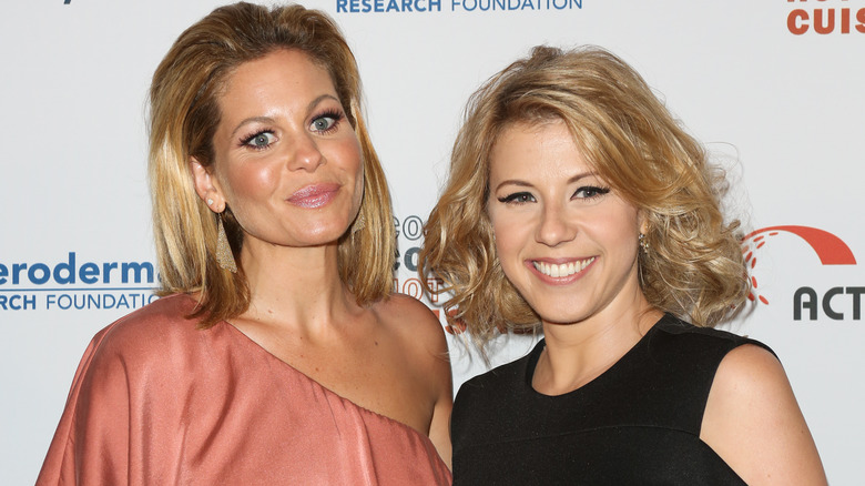 Candace Cameron Bure posing with Jodie Sweetin