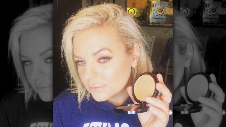 Kirsten Storms putting on make-up