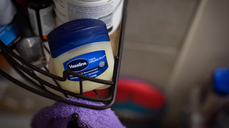 Jar of Vaseline on bathroom shelf