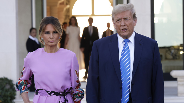 Melania and Donald Trump frowning