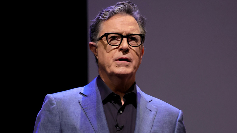 Stephen Colbert speaking at an event