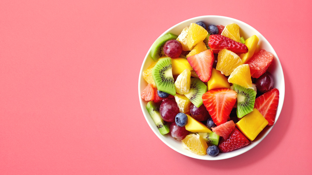 Bow of fruit pink background