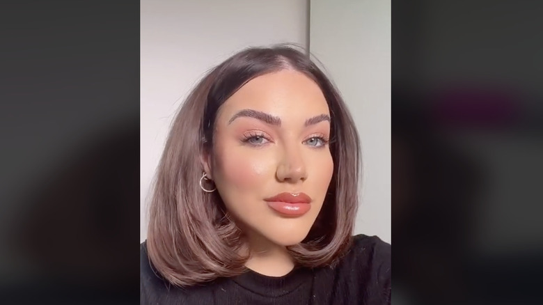 TikToker with voluminous bob