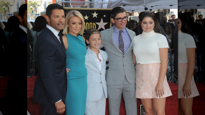 Mark Consuelos, Kelly Ripa, Joaquin Consuelos, Michael Consuelos, and Lola Consuelos smiling