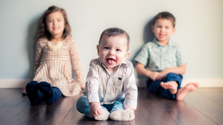 Baby with siblings