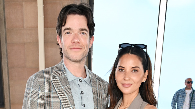 John Mulaney and Olivia Munn attend the Hermes SS25 Men's Show as part of Paris Fashion Week at Palais d'Iena in Paris, France (2024)