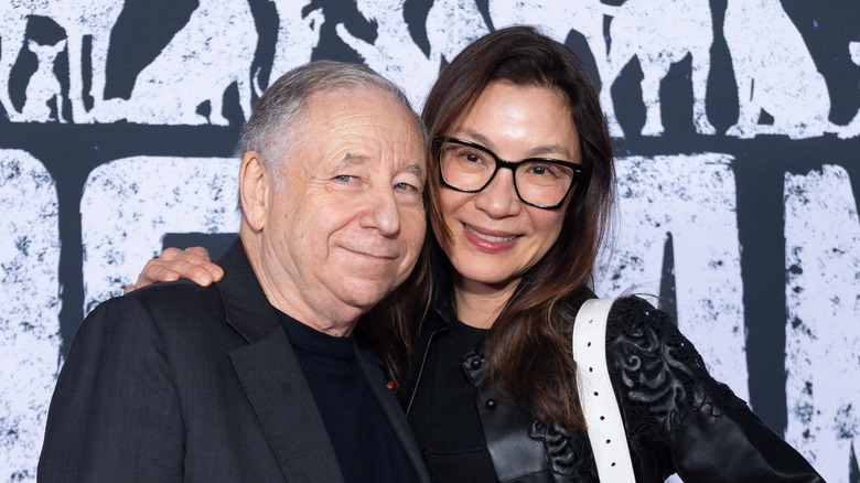 Michelle Yeoh and Jean Todt smiling while attending an event