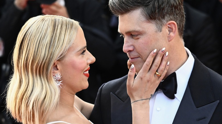 Scarlett Johansson embracing Colin Jost