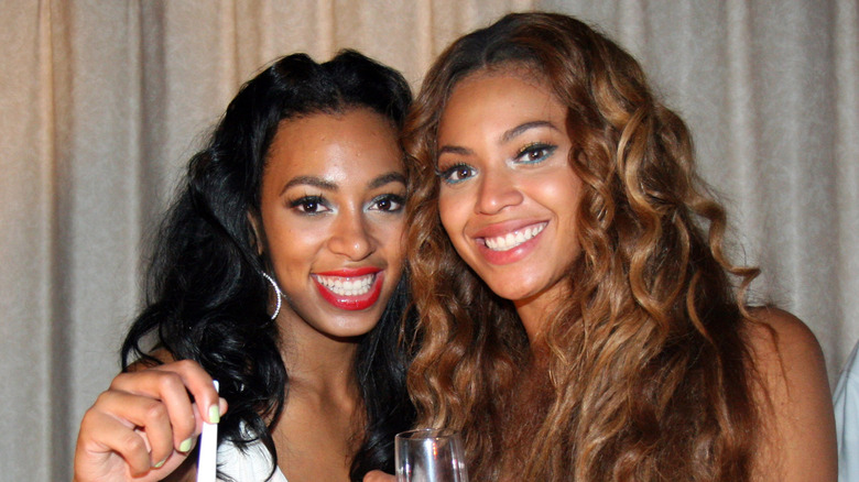 Beyonce and Solange Knowles posing at Solange's 21st birthday at Generations Hall in New Orleans, Louisiana in July 2007