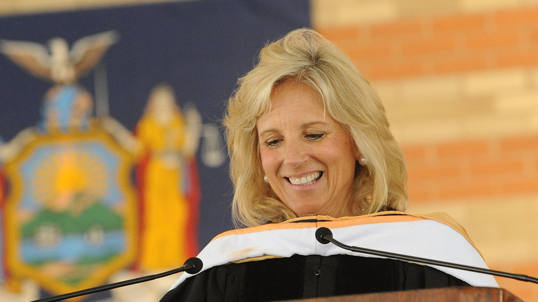 Dr. Jill Biden smiling while speaking at Kingsbourough Community College