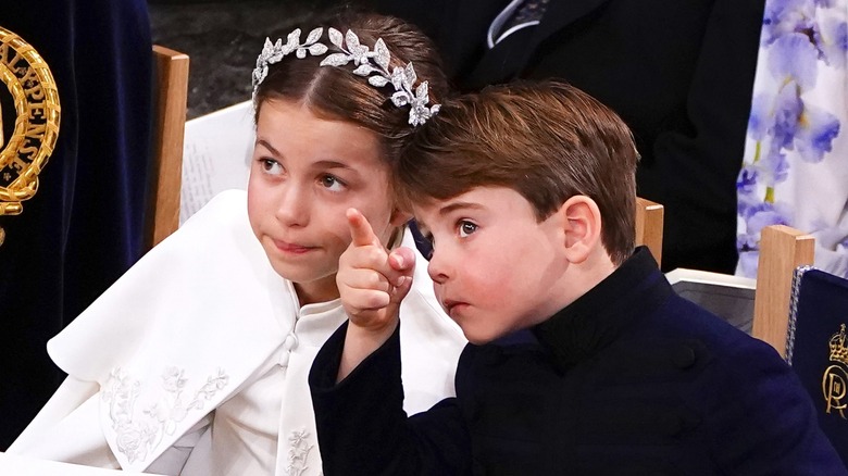 Princess Charlotte and Prince Louis pointing