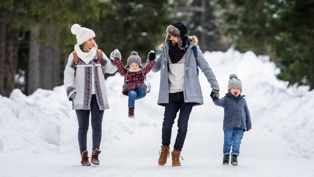 Family walking in the snow